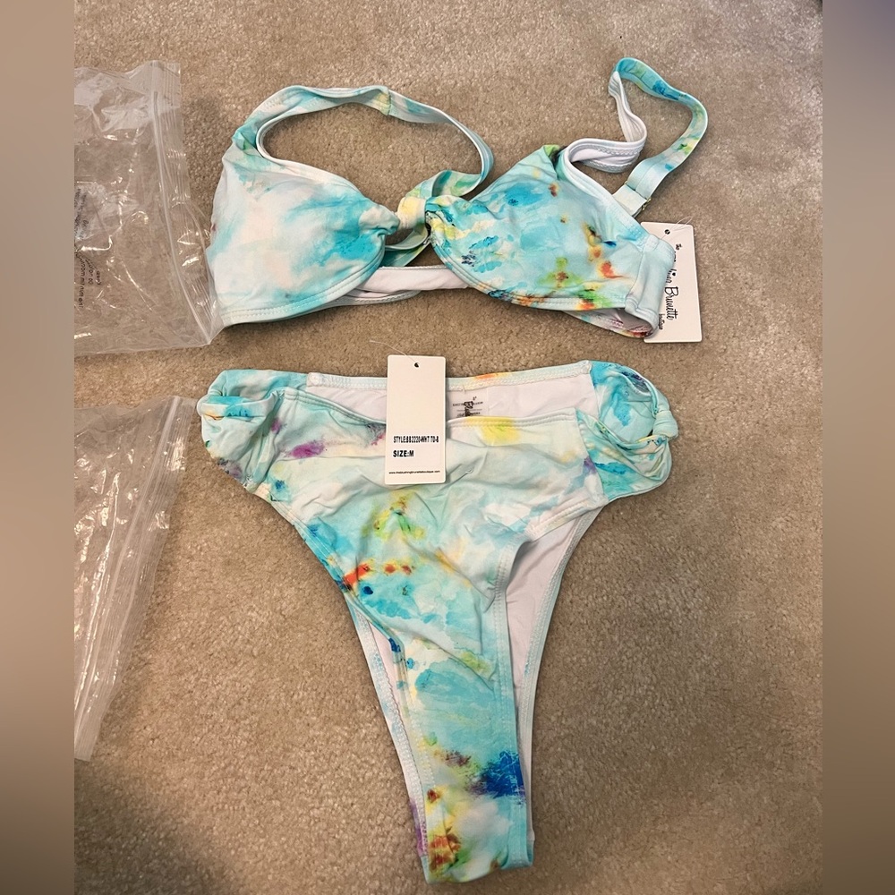 Blushing bruuette boutique bathing suit